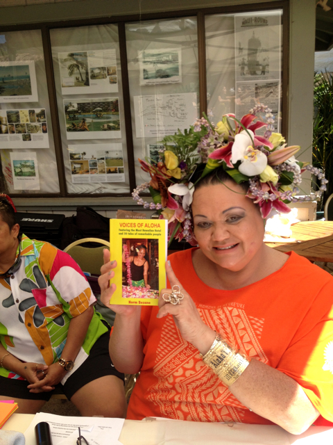 The popular "Morning Goddess" of KPOA radio displays the author's third book.