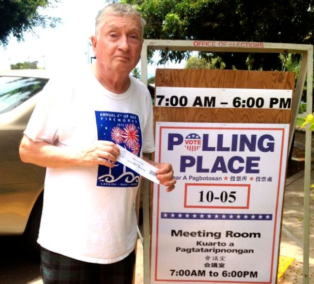 Blogger, reporter, photographer after voting at Lahaina Civic Center today.