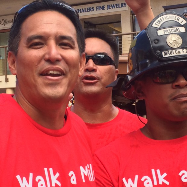 Ka'ala with some of his firemen friends who he used to play basketball with before running for election. Now he is out meeting voters. 