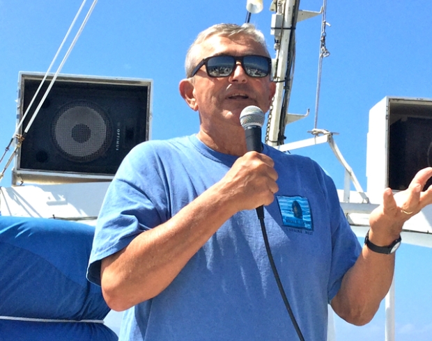 Flip NIcklin giving a talk on a whale watch cruise